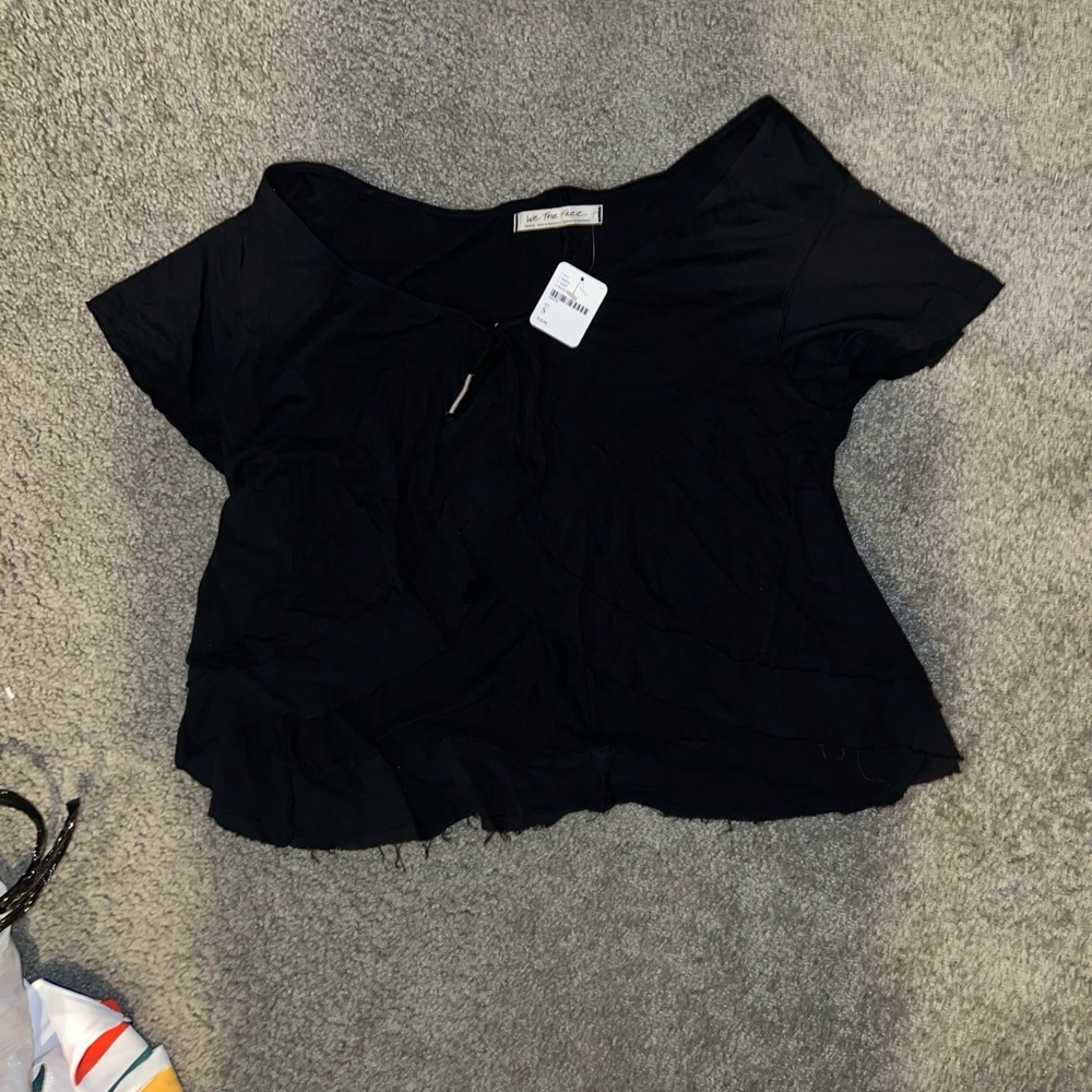 NWT- FREE PEOPLE. We the free black tie front top size small